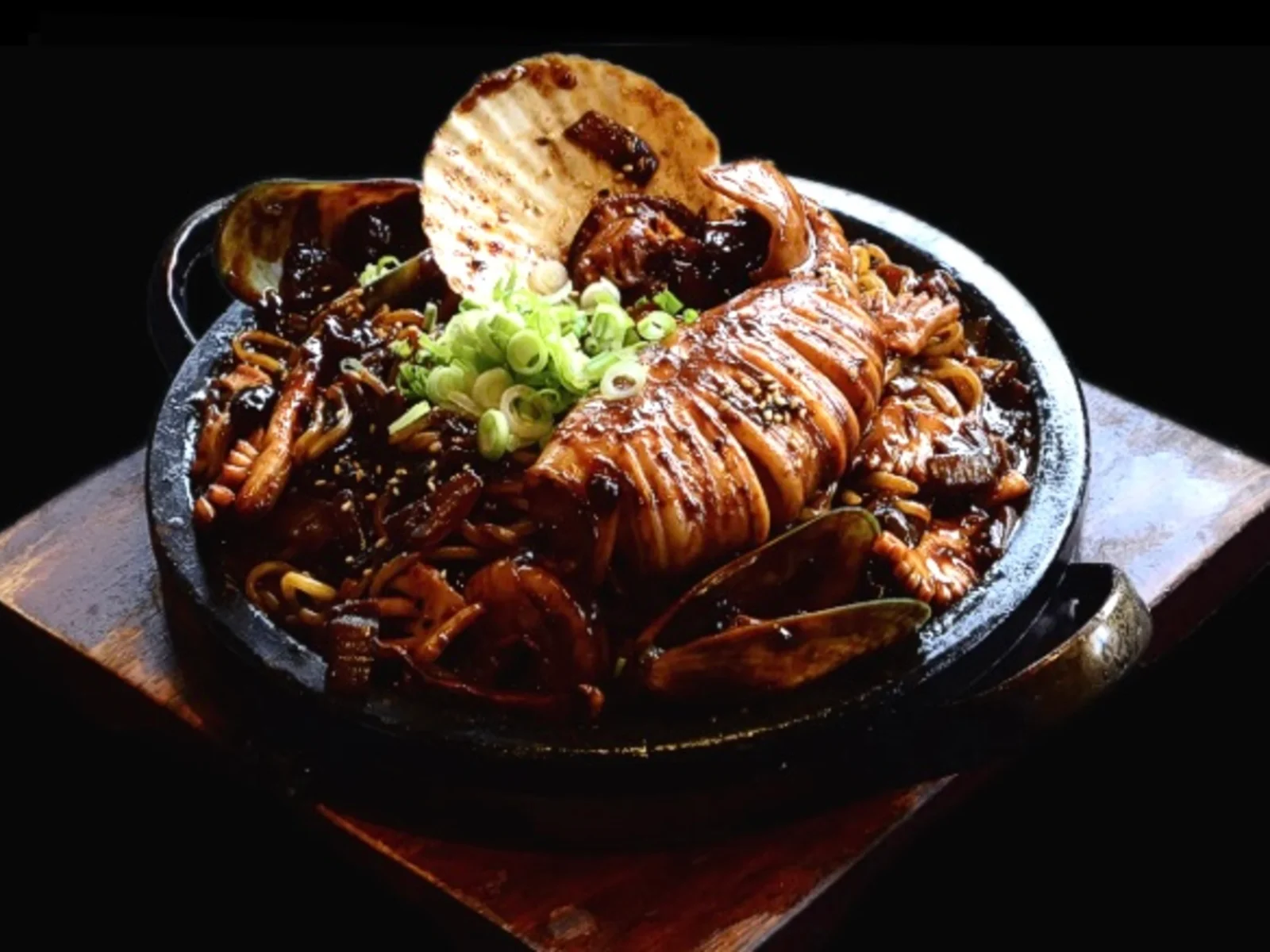 Seafood Black Bean Noodle on Hot Plate (해물돌판짜장)