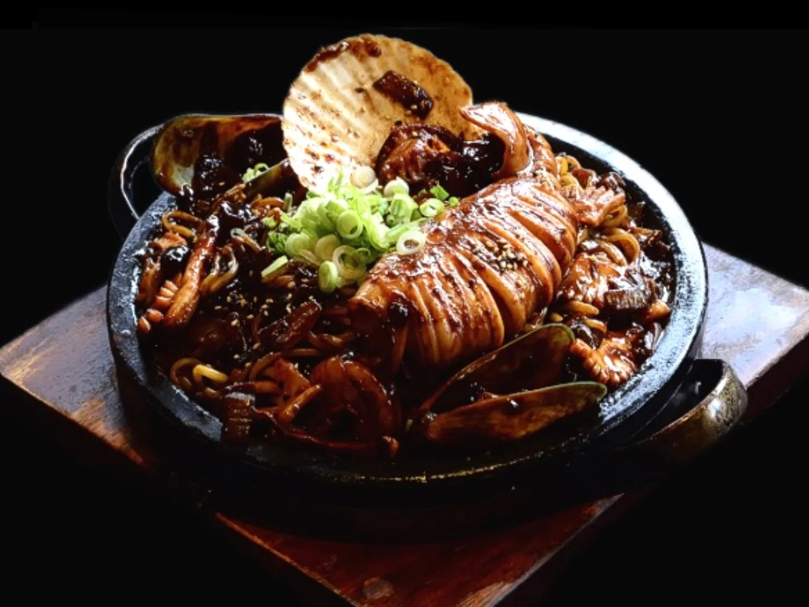 Spicy Seafood Black Bean Noodle on Hot Plate (사천해물돌판짜장)